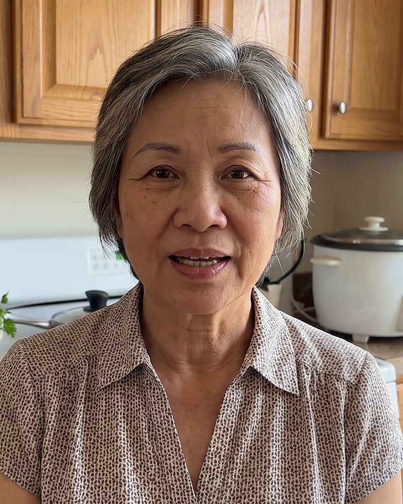 Miss Nguyen in her kitchen